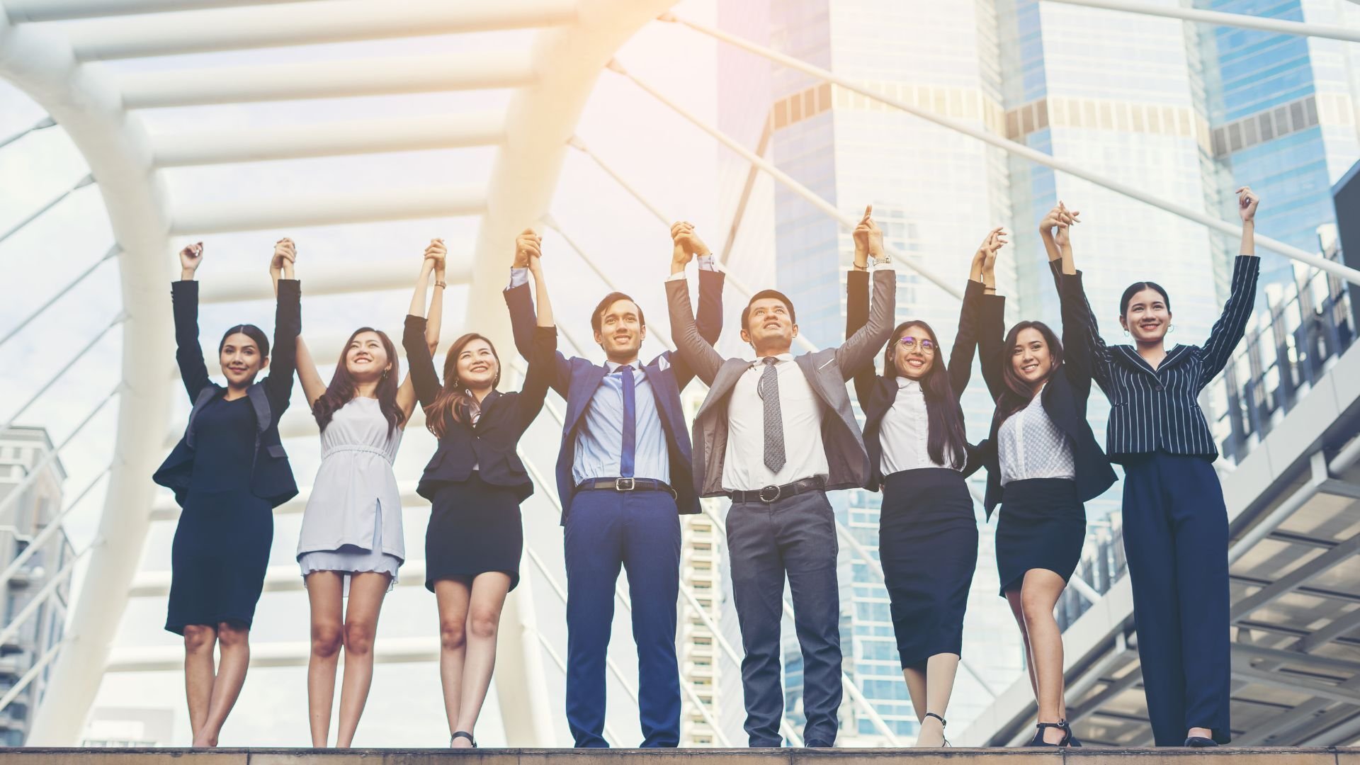 Corporate team celebrating success with recruitment outsourcing solutions in the Netherlands